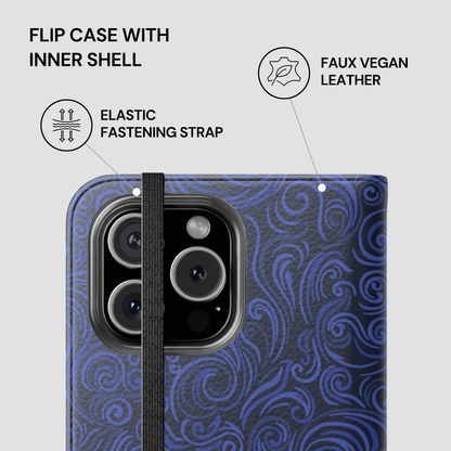 Flip case with inner shell featuring faux vegan leather, elastic fastening strap, and blue pattern on a gray background.