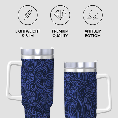 Two blue patterned tumblers with silver lids and handles on a white background, featuring icons and text describing features.