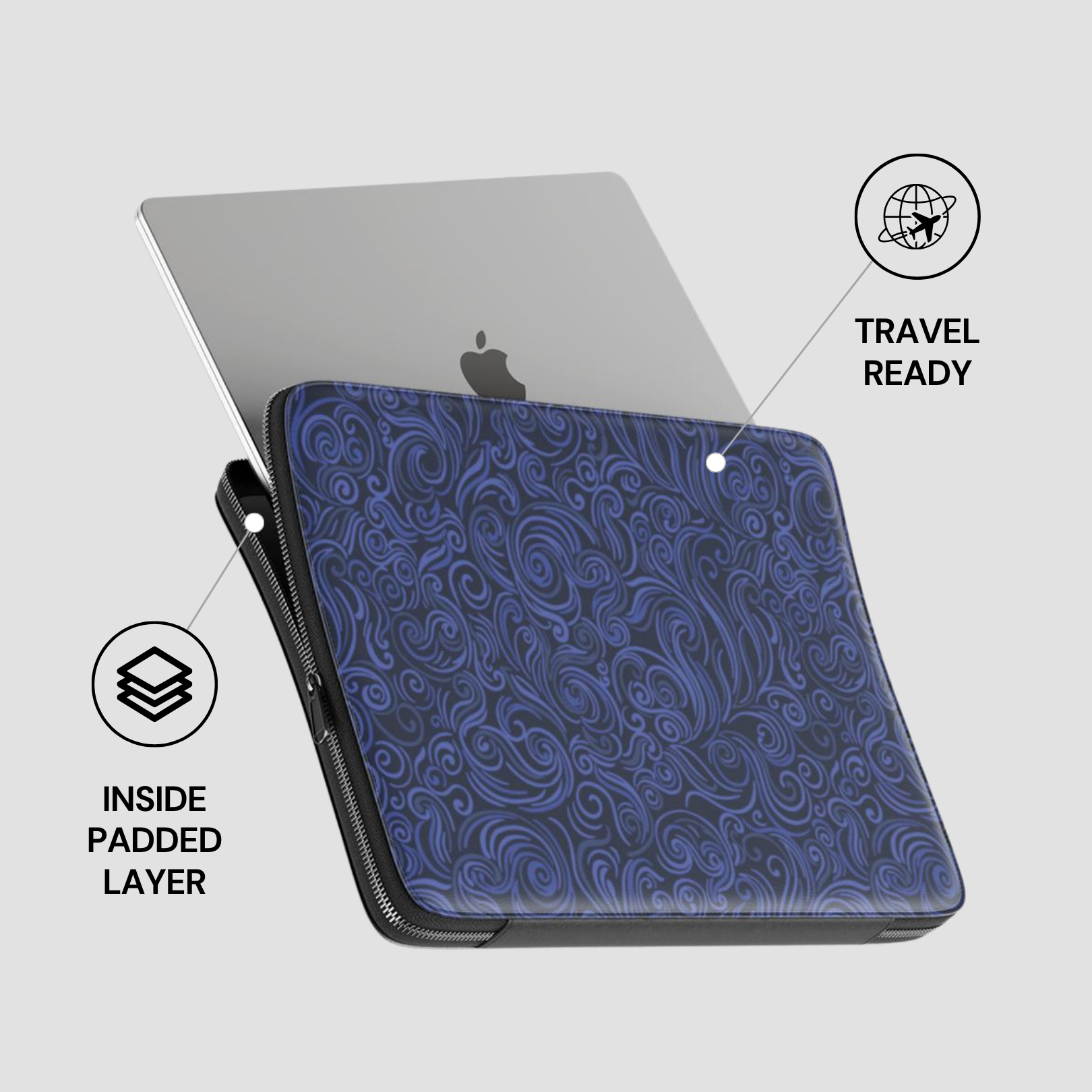 Blue patterned laptop sleeve with a silver laptop inside on a light gray background
