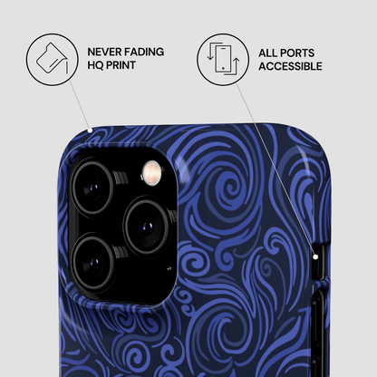 Blue patterned phone case with accessibility features on a light gray background