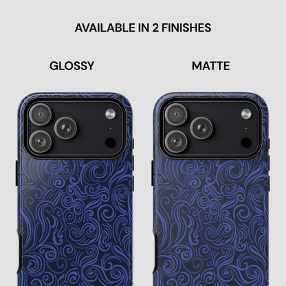 Two phone cases with blue pattern, one glossy and one matte, on a light gray background.