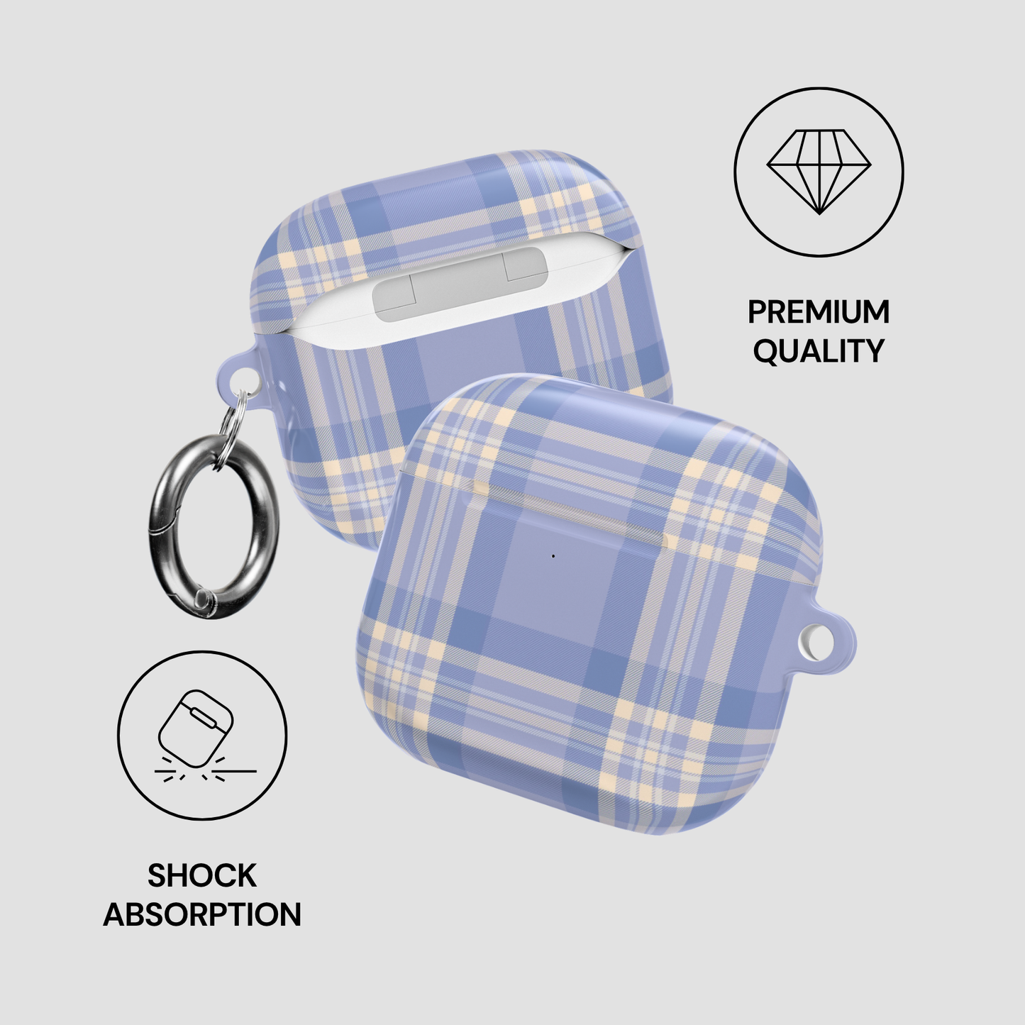 Blue and yellow plaid airpod case with keychain on a light gray background