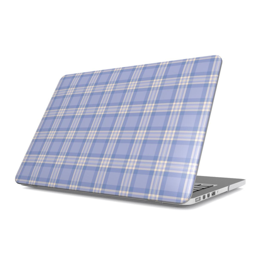 Laptop with a blue plaid design on a white background