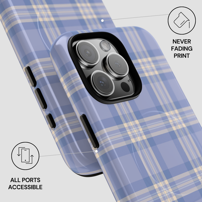 Blue and yellow plaid phone case with camera and port accessibility features on a light gray background.