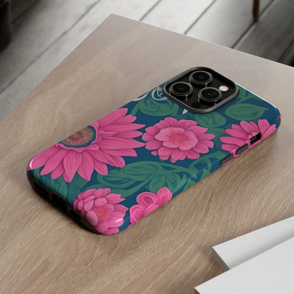 Phone case with pink floral design on a wooden surface