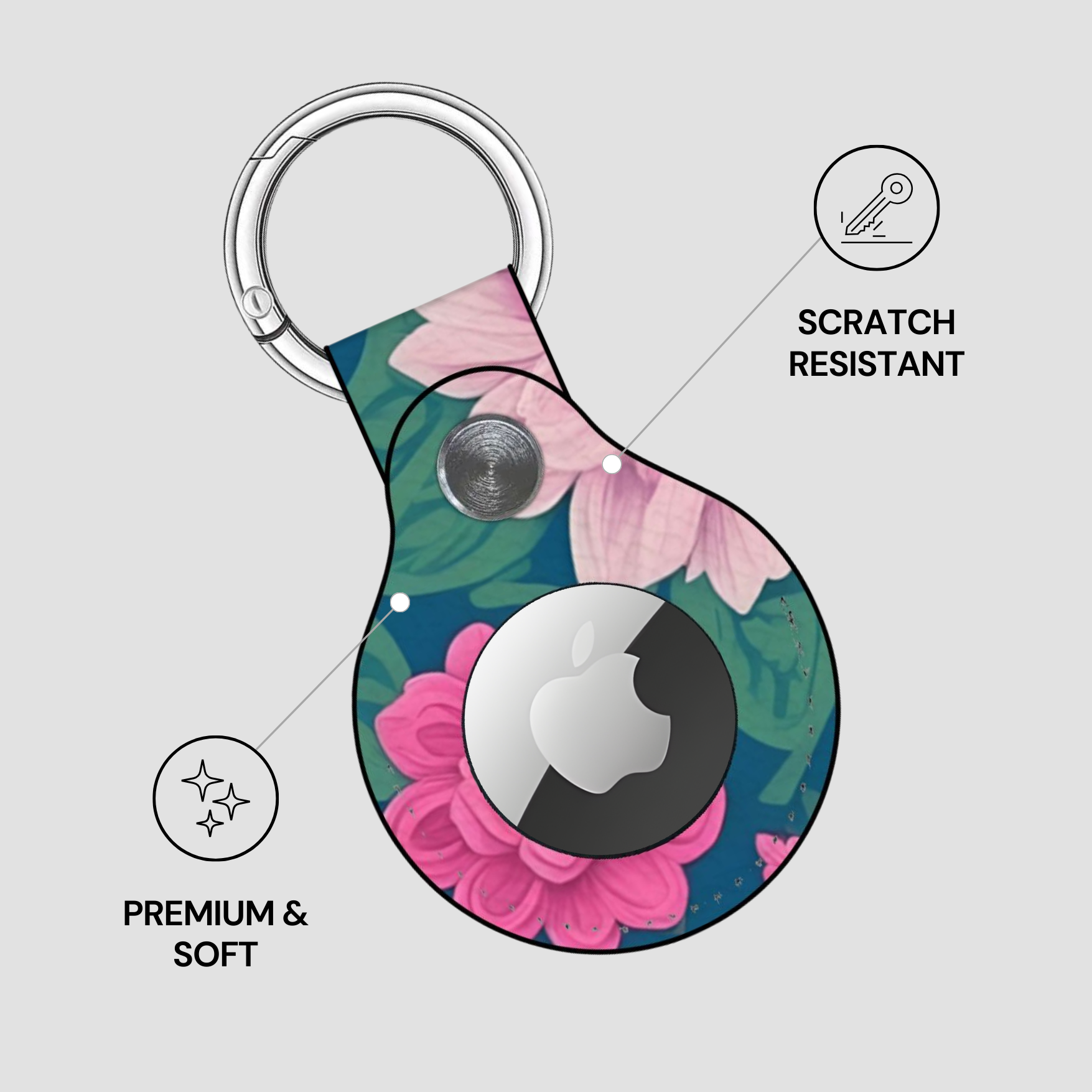 Floral design keychain with Apple logo on a light gray background