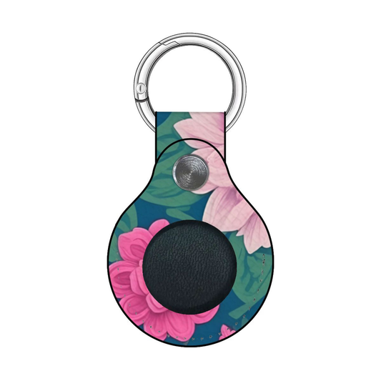 Floral patterned keychain with a black circle in the center on a white background