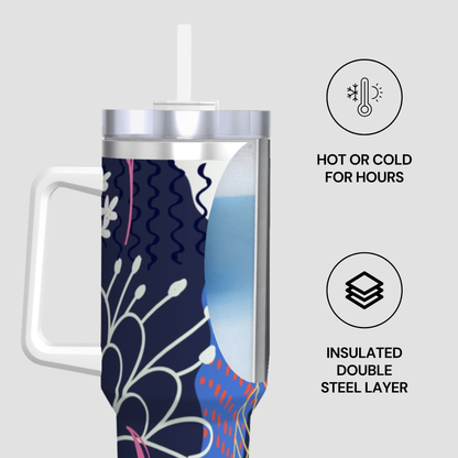Insulated tumbler with floral design on a white background