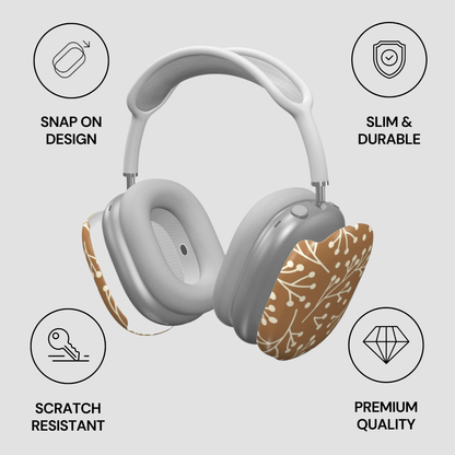 Gray headphones with floral ear pads on a light gray background with feature icons.