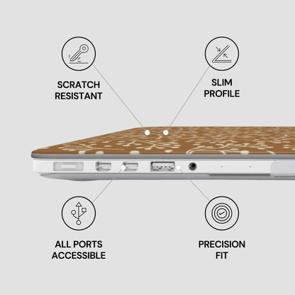 Laptop with features labeled as scratch resistant, slim profile, all ports accessible, and precision fit on a light gray background.