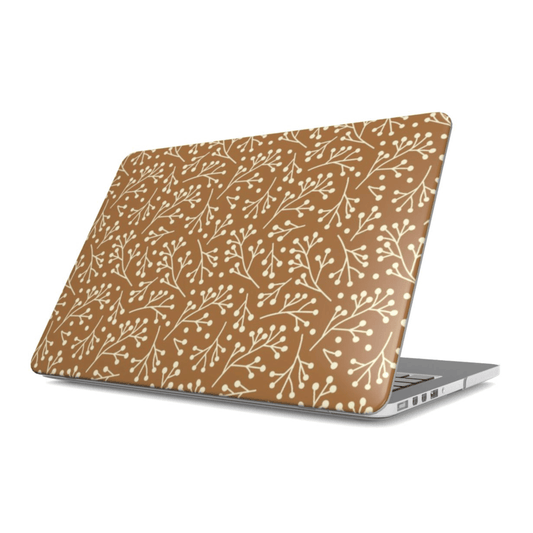 Laptop with a brown floral pattern on a white background