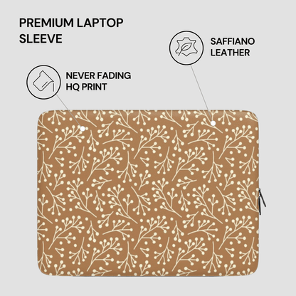 Laptop sleeve with floral pattern and text highlighting features on a light gray background