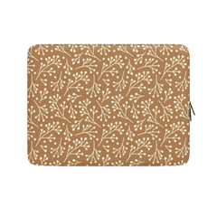 Laptop sleeve with floral pattern on a beige background