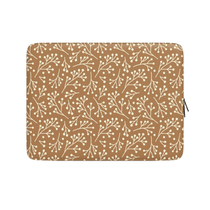Laptop sleeve with floral pattern on a beige background