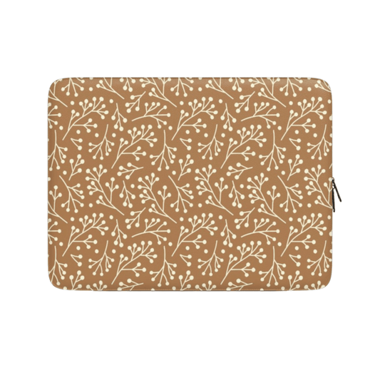 Laptop sleeve with floral pattern on a beige background