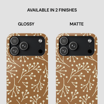 Two phone case designs with floral pattern, one glossy and one matte, on a white background.