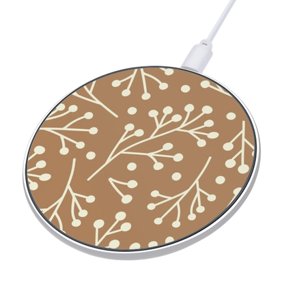 Round wireless charging pad with floral pattern on a white background