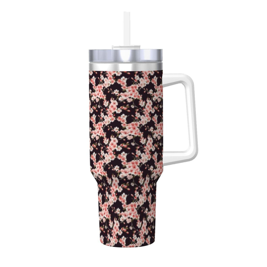 Floral-patterned tumbler with a handle on a white background | Casenari
