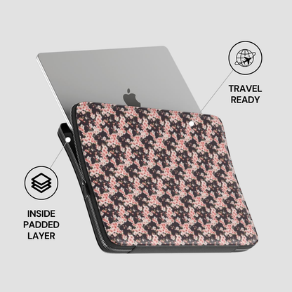 Floral patterned laptop sleeve with Apple laptop on a light gray background | Casenari