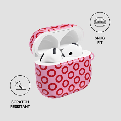 Pink circular patterned case with white wireless earbuds, featuring 'Snug Fit' and 'Scratch Resistant' icons on a light gray background.