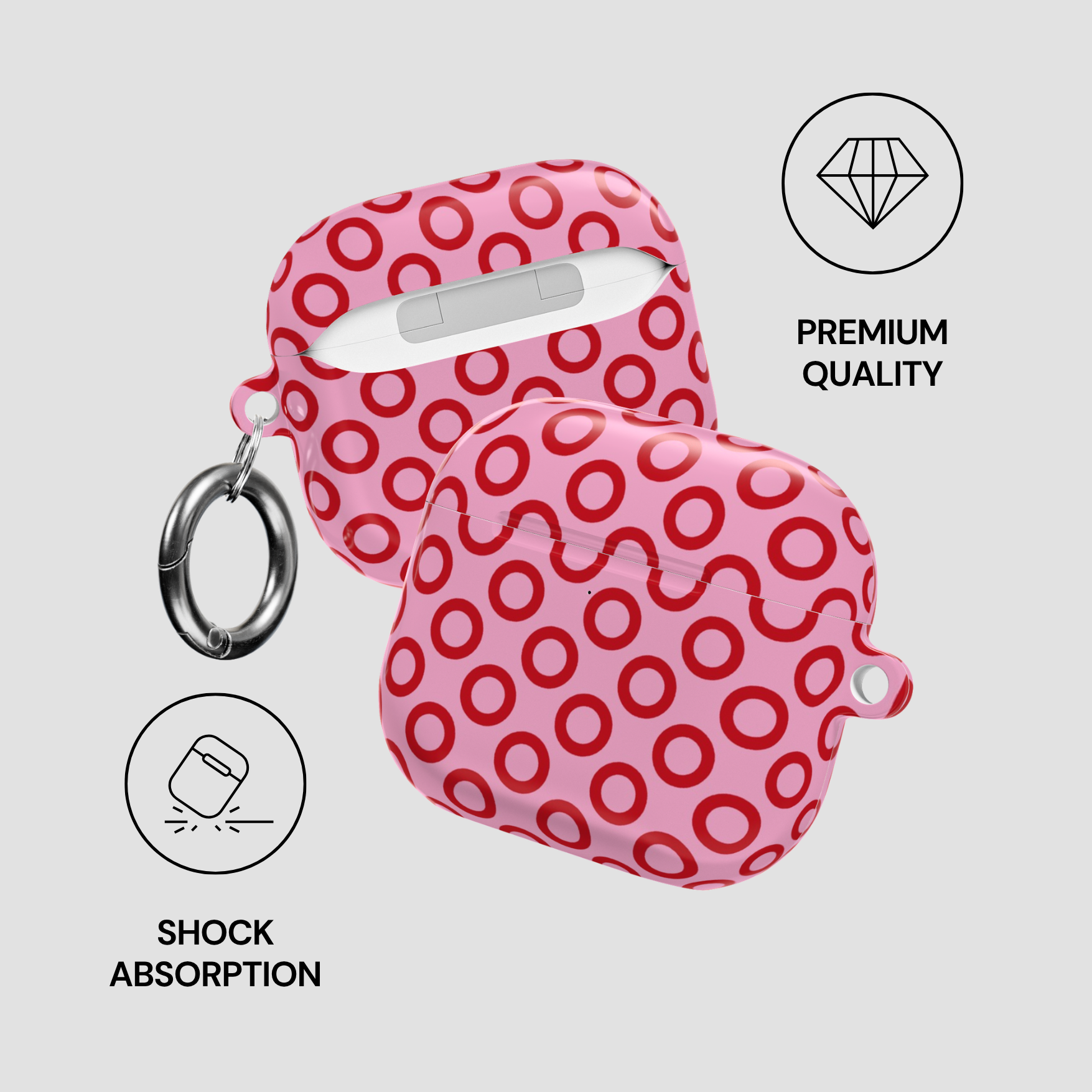 Pink case with red circular pattern and keychain on a light gray background