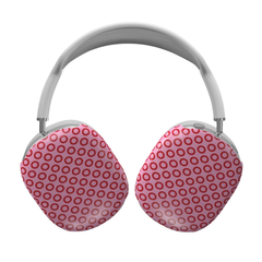 Pink and red polka dot headphones on a white background