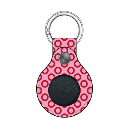 Keychain with pink circular pattern on a white background