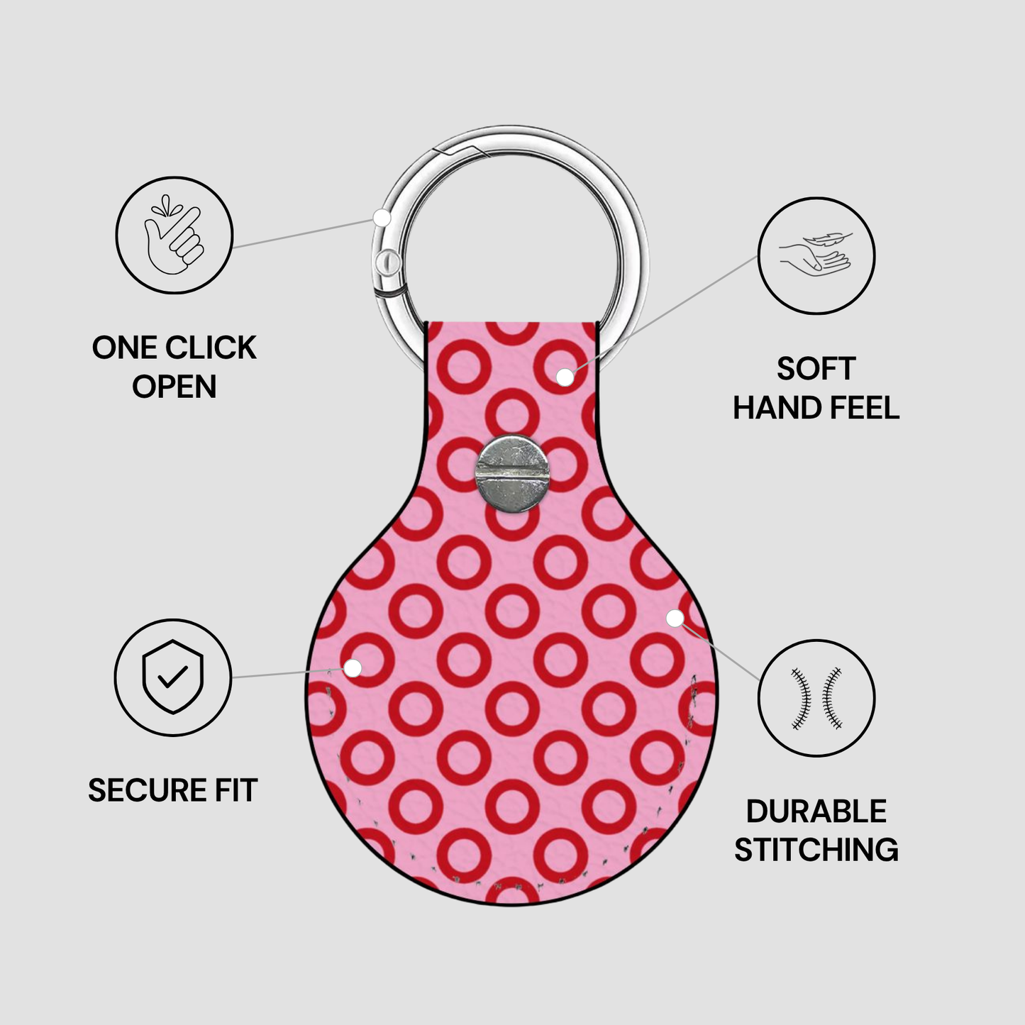 Pink keychain with red circular pattern on a gray background with feature text.