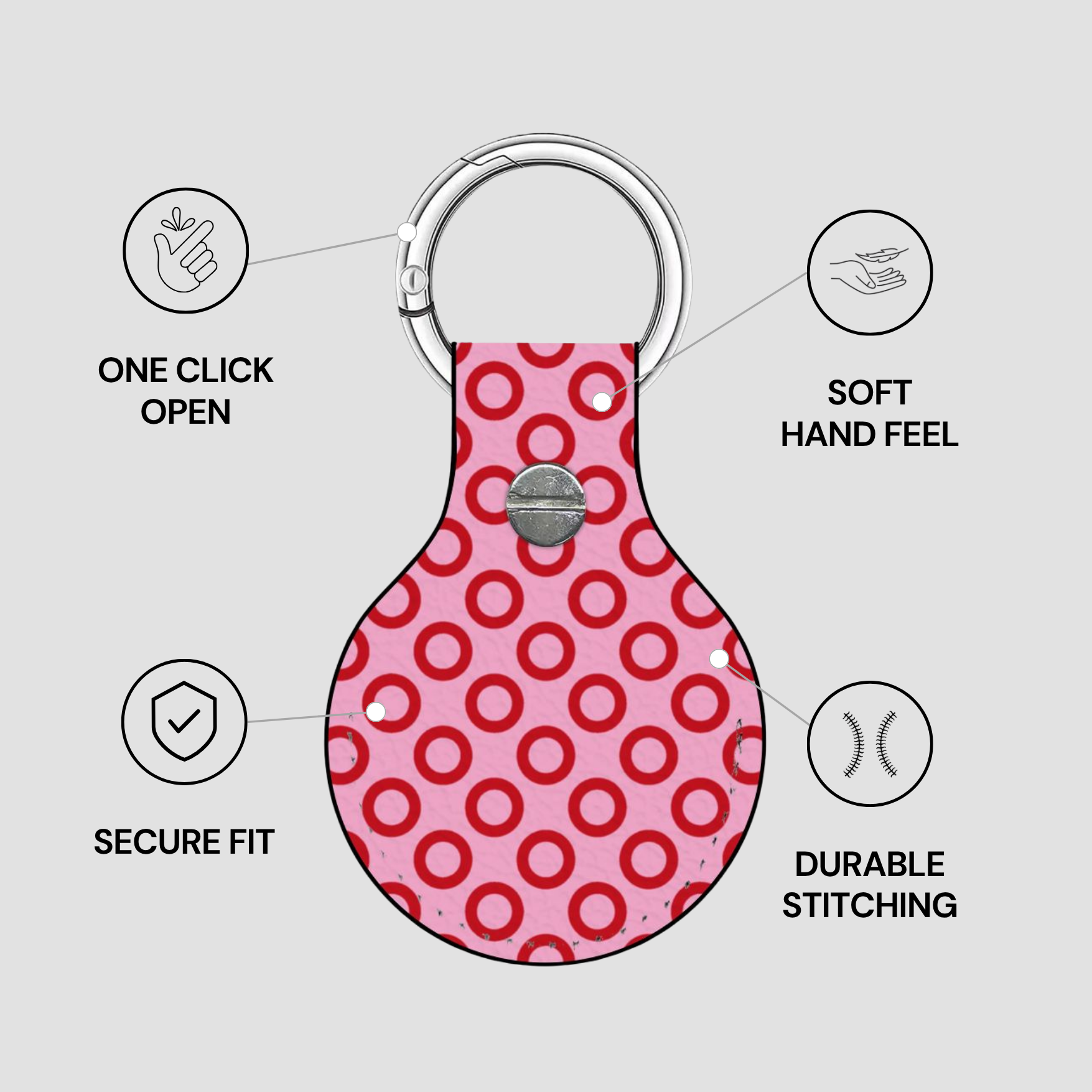 Pink keychain with red circular pattern on a gray background with feature text.