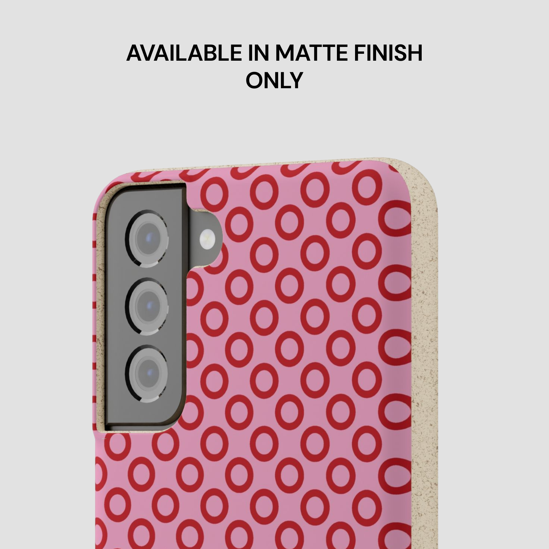 Phone case with red circular pattern on pink background
