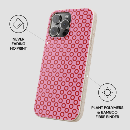 Phone case with pink circular pattern on a white background