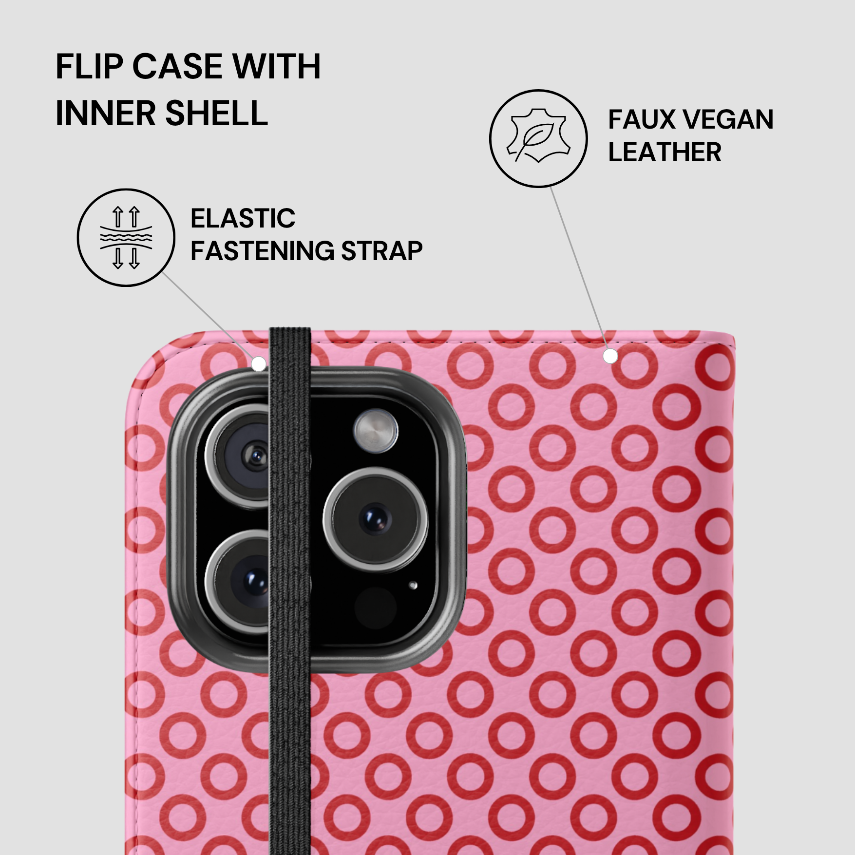 Pink flip case with red circular pattern and elastic fastening strap on a white background