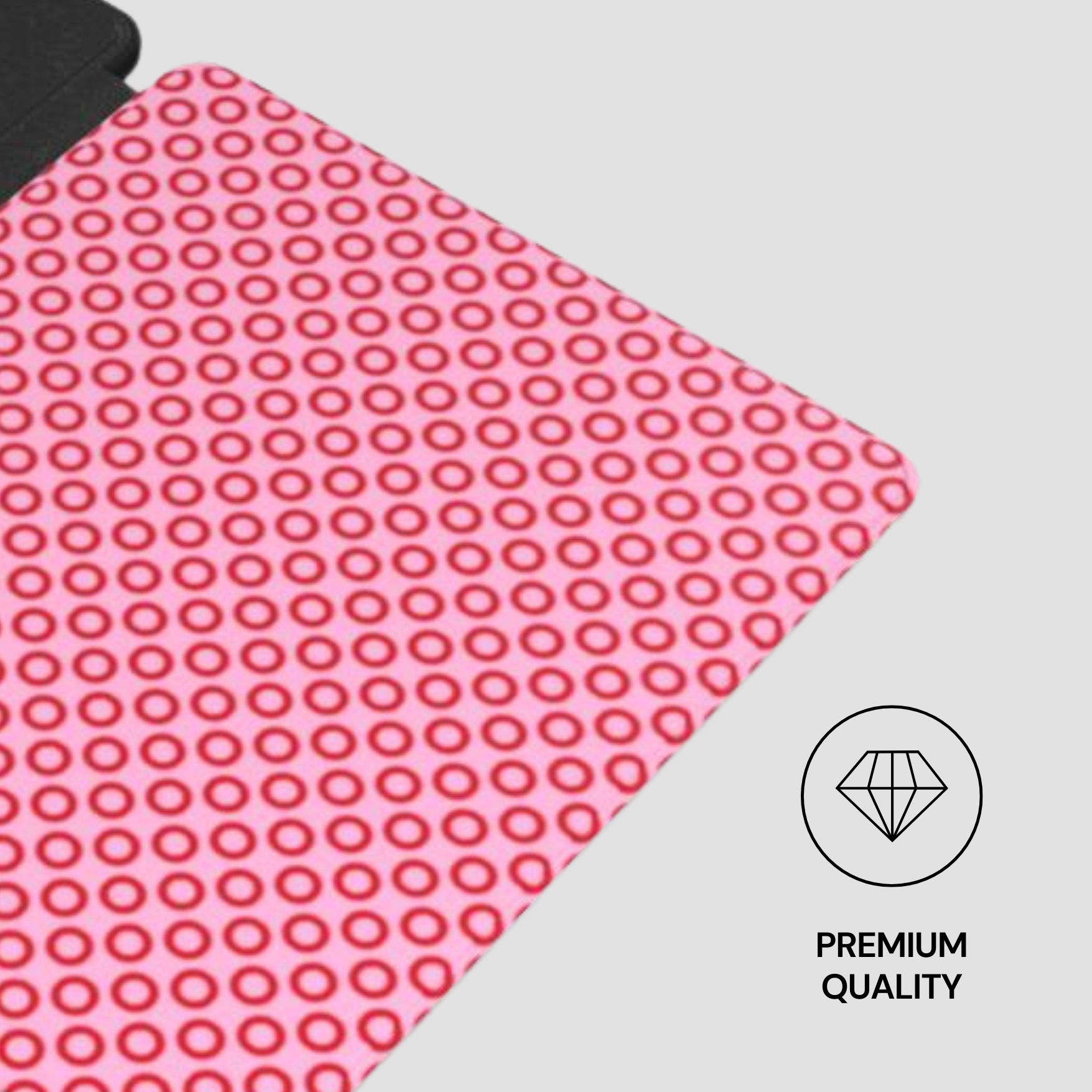 Pink textured mat with red circular pattern on a gray background, featuring a 'Premium Quality' label.