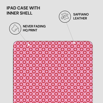 Pink polka dot iPad case with text highlighting features on a gray background