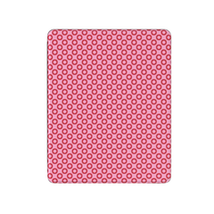 Pink silicone mat with circular pattern on a white background