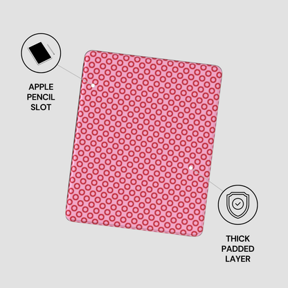 Pink case with circular pattern on a white background, featuring an Apple Pencil slot and thick padded layer.