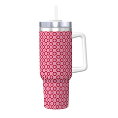 Pink polka dot mug with a white handle and silver lid on a white background