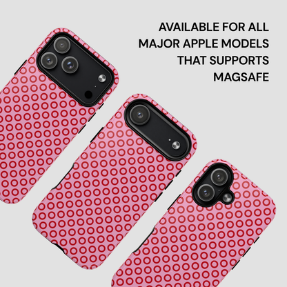 Pink phone case with circular pattern on a light gray background