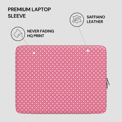 Pink laptop sleeve with text highlighting features on a gray background