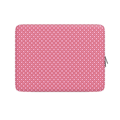 Pink polka dot laptop sleeve on a white background