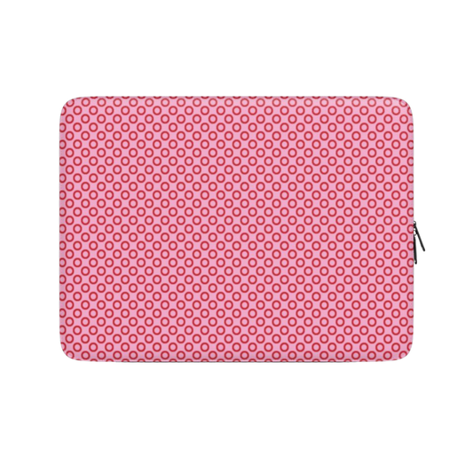 Pink polka dot laptop sleeve on a white background