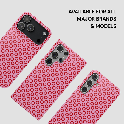 Pink phone case with red circular pattern on a light gray background