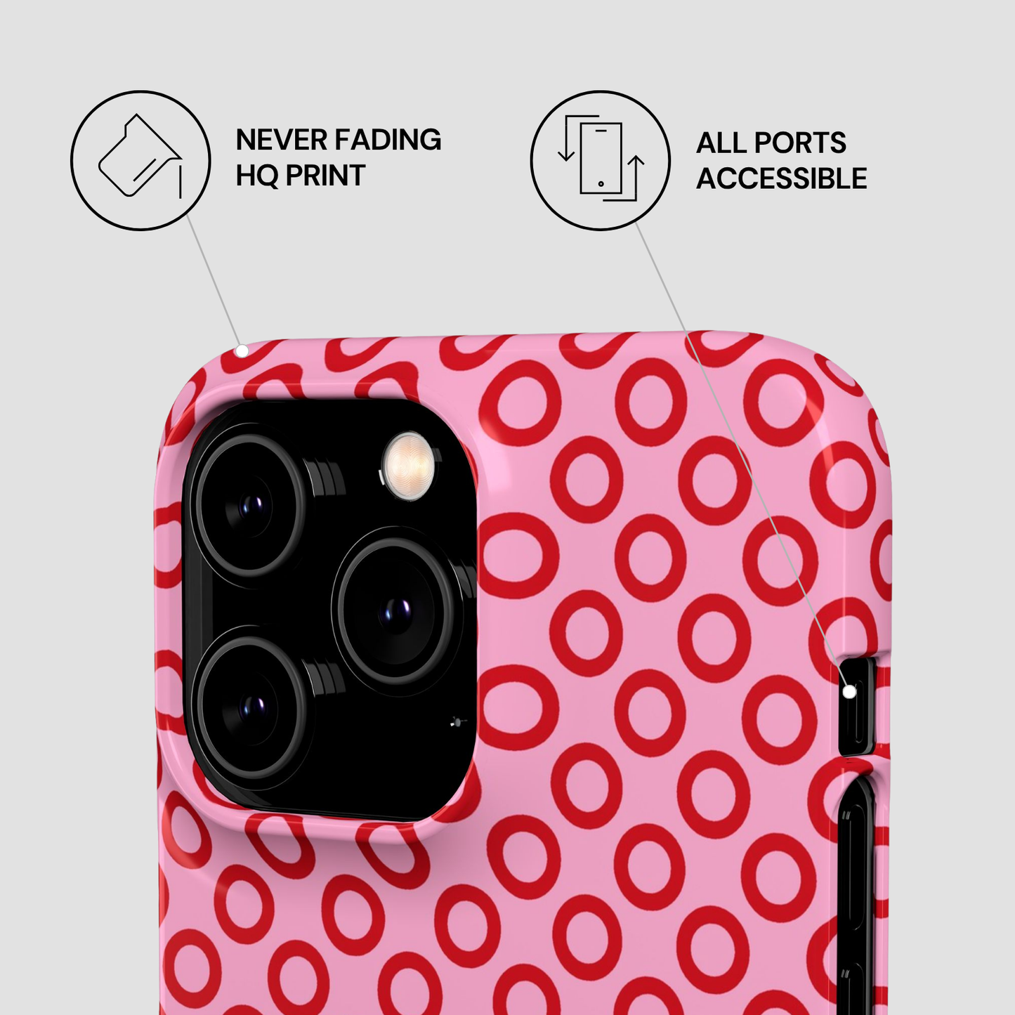 Pink phone case with red circular pattern on a white background