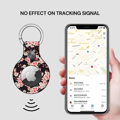 Smart keychain with floral design and phone displaying location app on a light gray background | Casenari