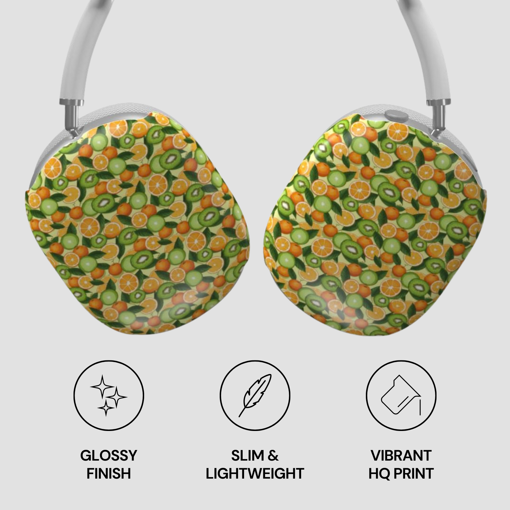Headphones with a fruit pattern on a light gray background
