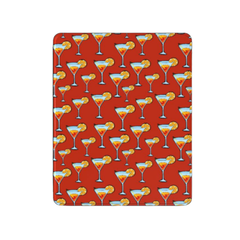 Pattern of cocktail glasses with orange slices on a red background