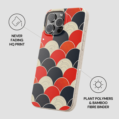 Phone case with red, black, and beige circular pattern on a gray background