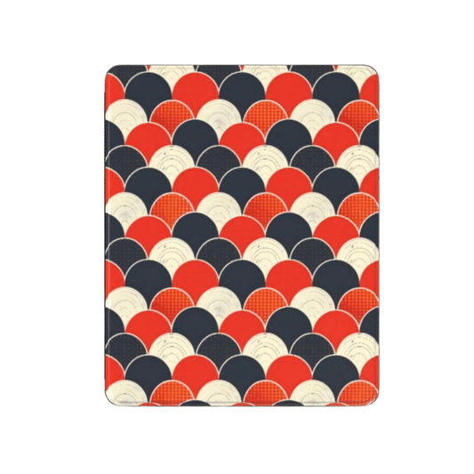 Patterned mouse pad with red, blue, and beige circles on a white background