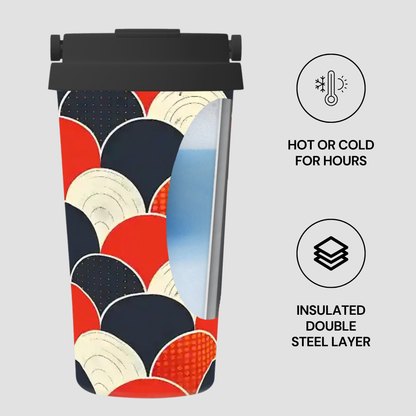 Insulated tumbler with colorful geometric pattern on a white background