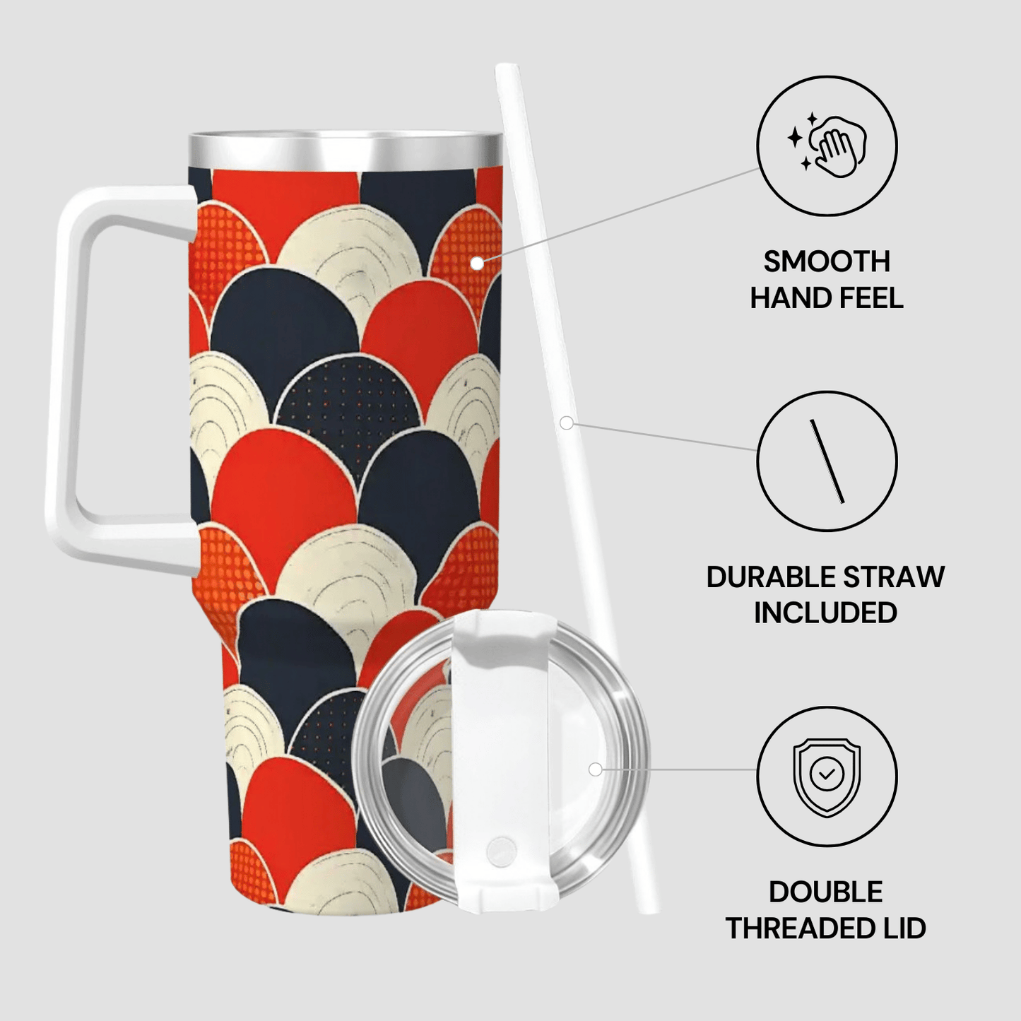 Colorful mug with geometric pattern, straw, and lid on a light gray background